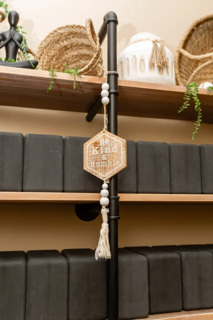 Hanging wooden Be Kind and Humble sign