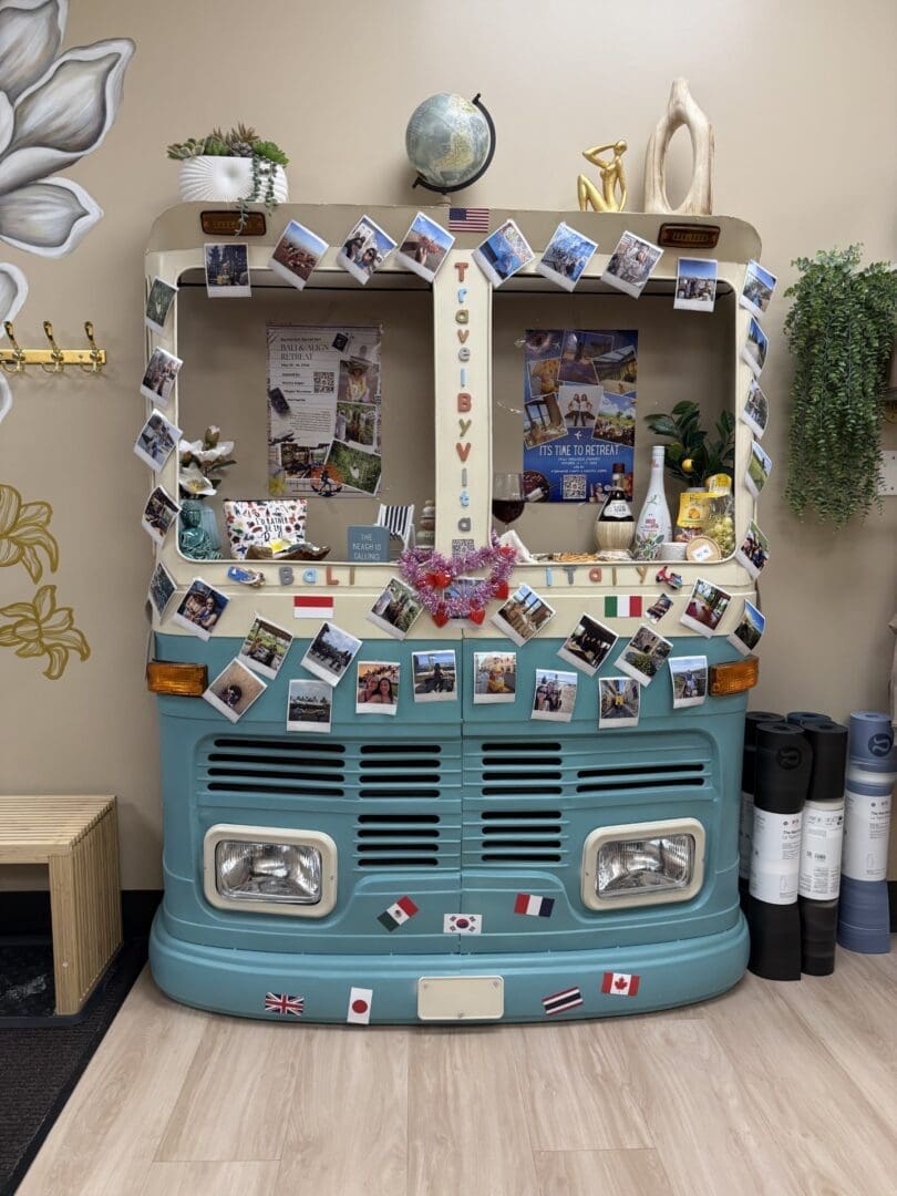 Vintage van front decorated with travel photos