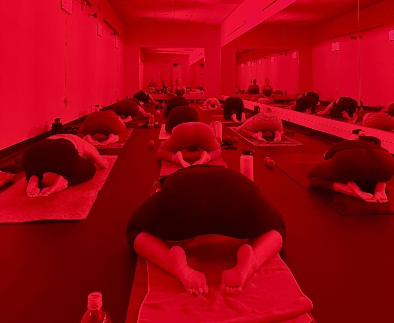 Red and green light room at Vitara Hot Yoga