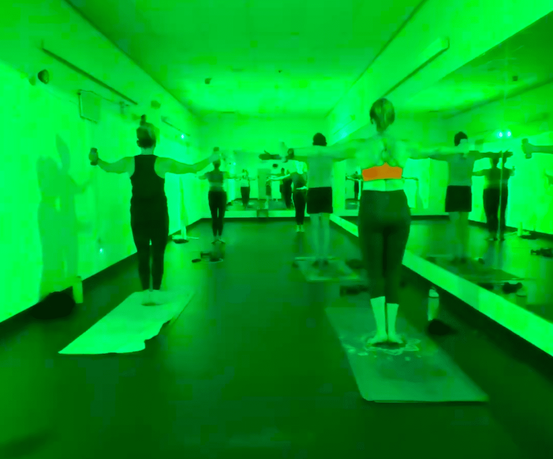 Green light yoga room at Vitara Hot Yoga