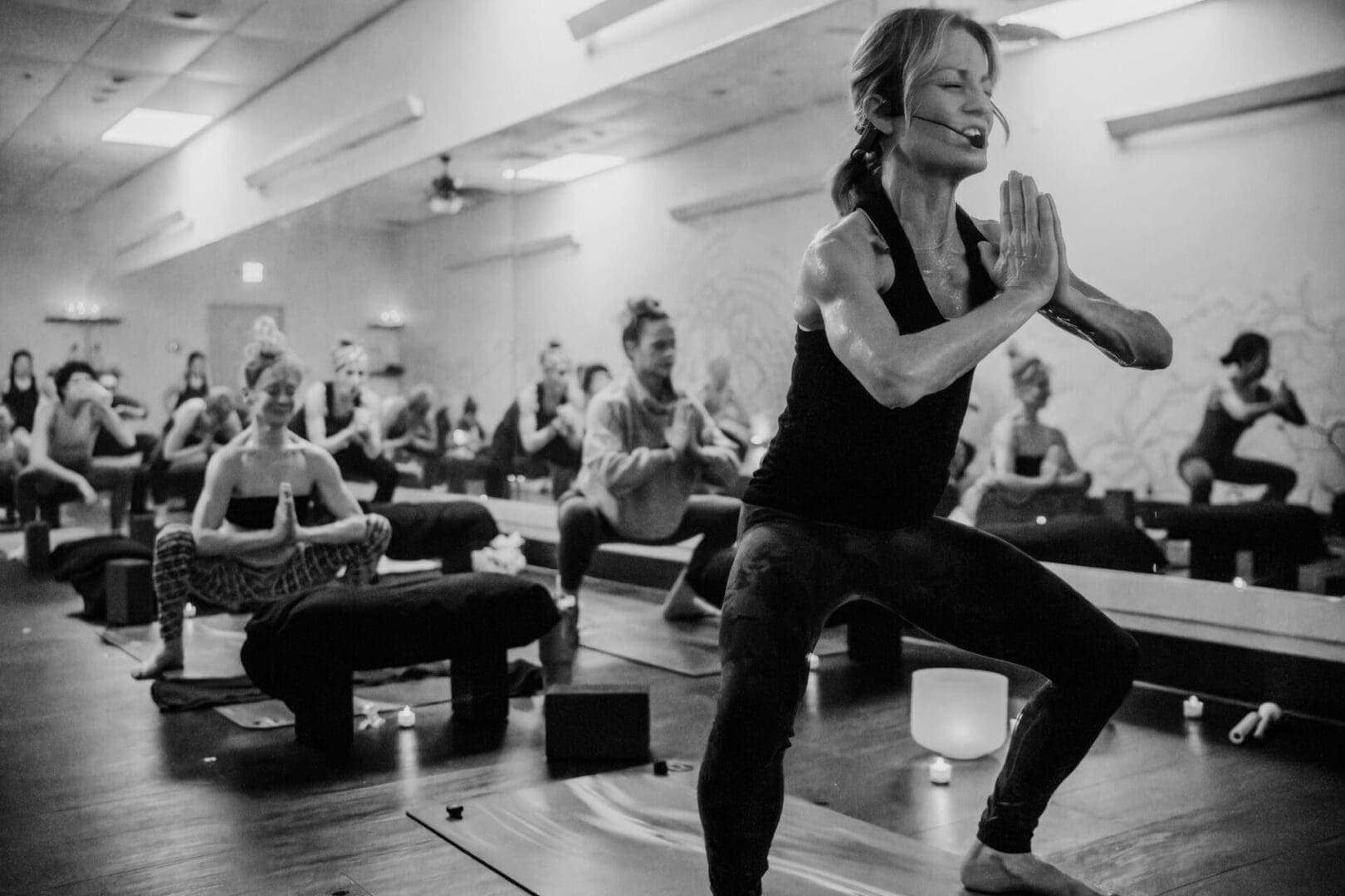 Teacher guiding a Vitara Hot Yoga class near Exeter NH
